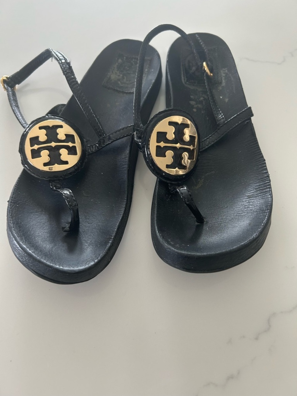 Tory Burch Black Patent Thong Sandals with Gold Logo Medallions
